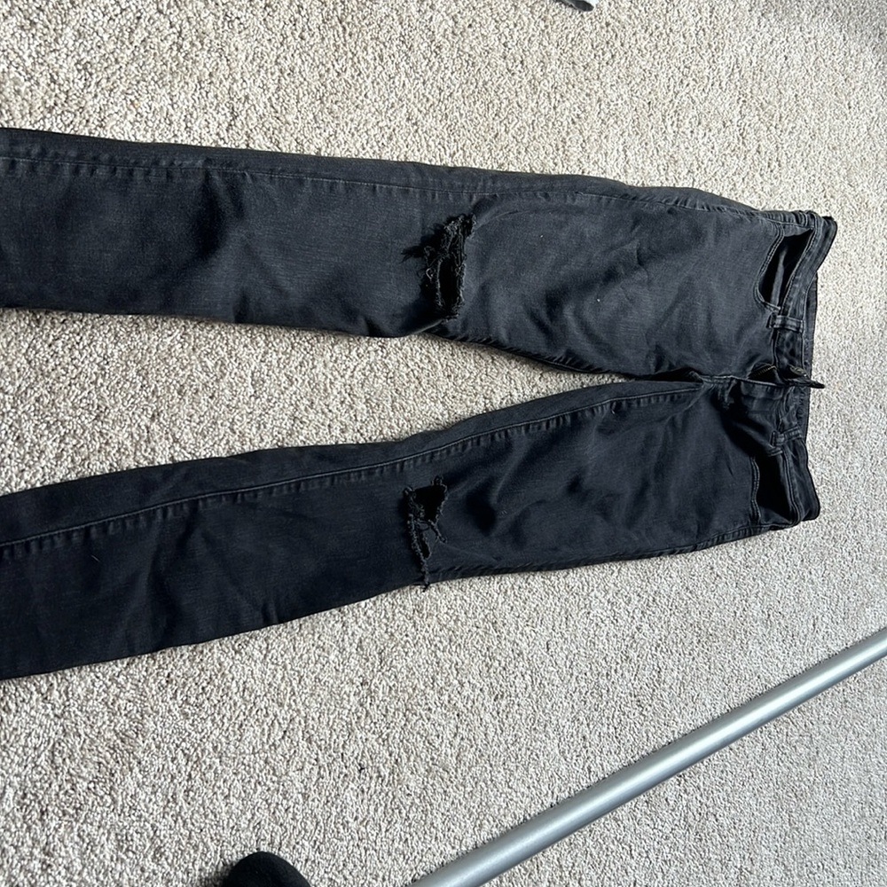 American Eagle Black Jeggings
Hole in Knee